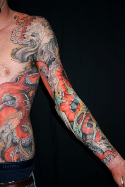 Awesome Grey And Orange Octopus Sleeve Tattoo