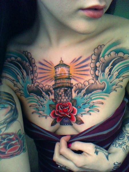 Beautiful Red Rose And Lighthouse Tattoo On Girl Chest
