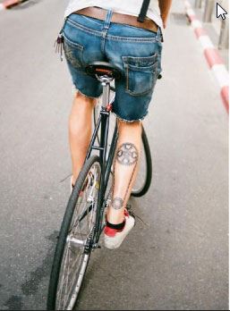Bike Two Gears With Chain Tattoo On Right Lag Calf