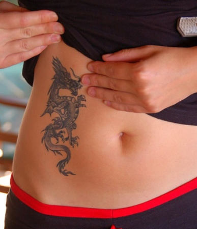 Black And Grey Dragon Tattoo On Belly