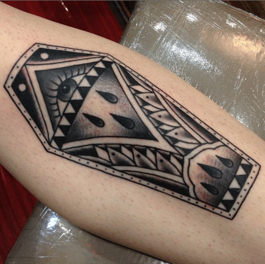 Black And Grey Ink Coffin Tattoo