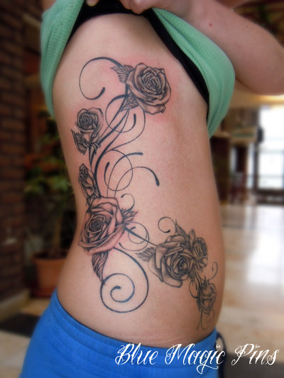Black And Grey Roses Tattoo On Girl Side Belly