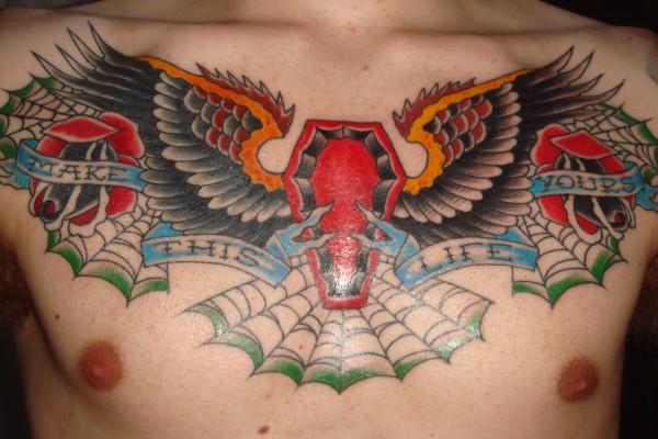 Black And Grey Wings With Coffin Tattoo On Chest