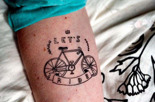 Black Bike With Banner Tattoo Design