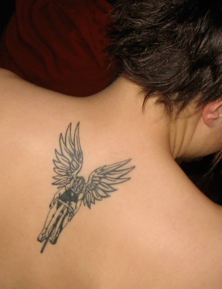 Black Biker With Wings Tattoo On Man Upper Back