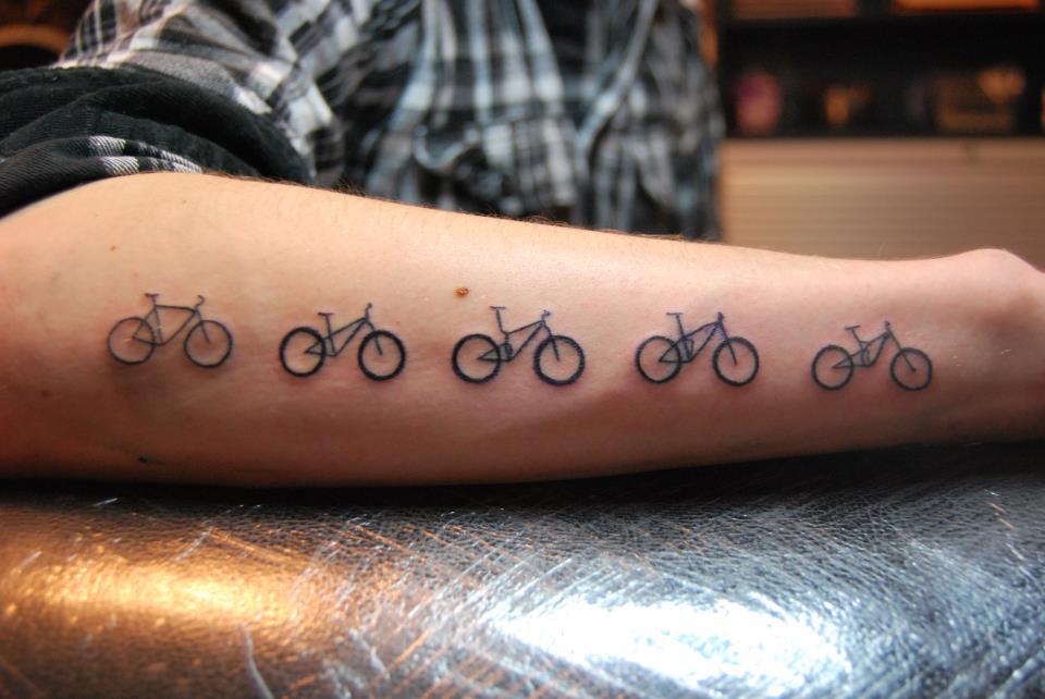 Black Five Bike Tattoo On Forearm