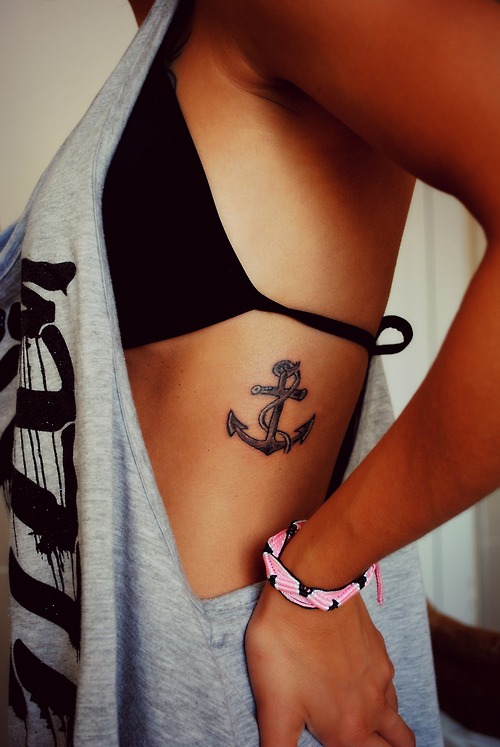 Black Ink Anchor Tattoo On Girl Side Belly