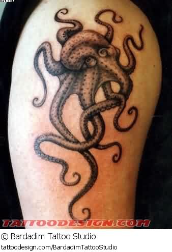 Black Ink Aqua Octopus Tattoo On Shoulder
