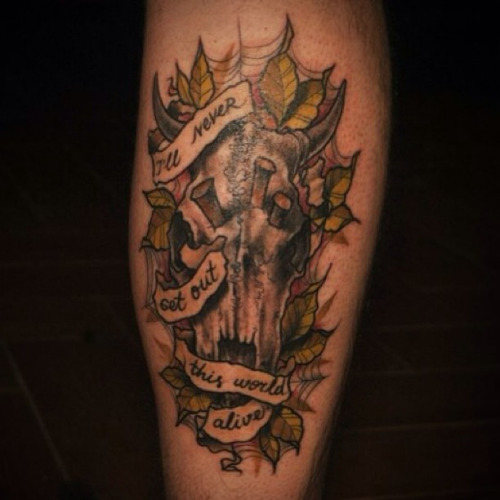 Black Ink Cow Skull With Banner Tattoo Design For Arm