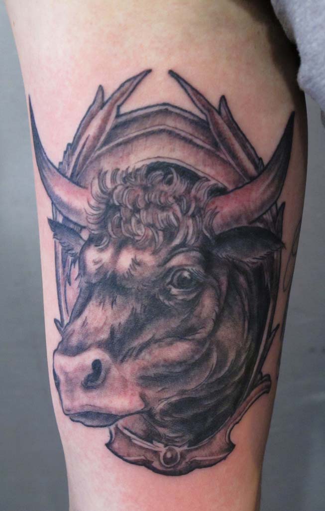 Black Ink Cow Tattoo Design For Half Sleeve