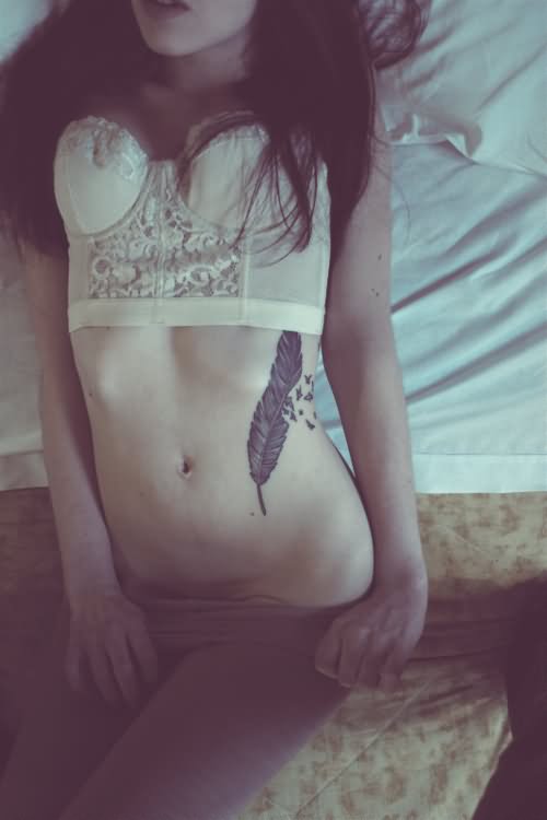 Black Ink Feather Tattoo On After Pregnancy Belly