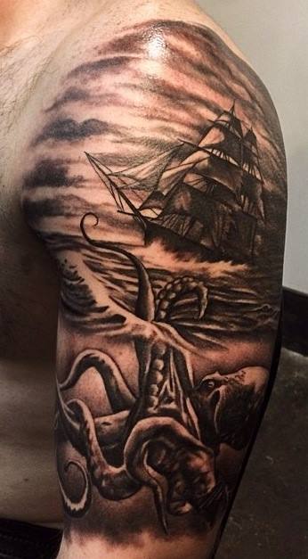 Black Ink Kraken Attacking Ship Tattoo On Man Left Shoulder