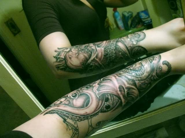 Black Ink Kraken Monster Tattoo On Arm By Brita Rae Winquist