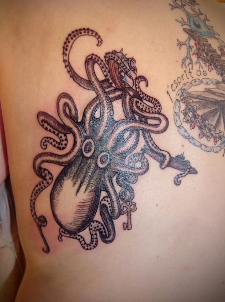 Black Ink Kraken Tattoo Design For Side Rib