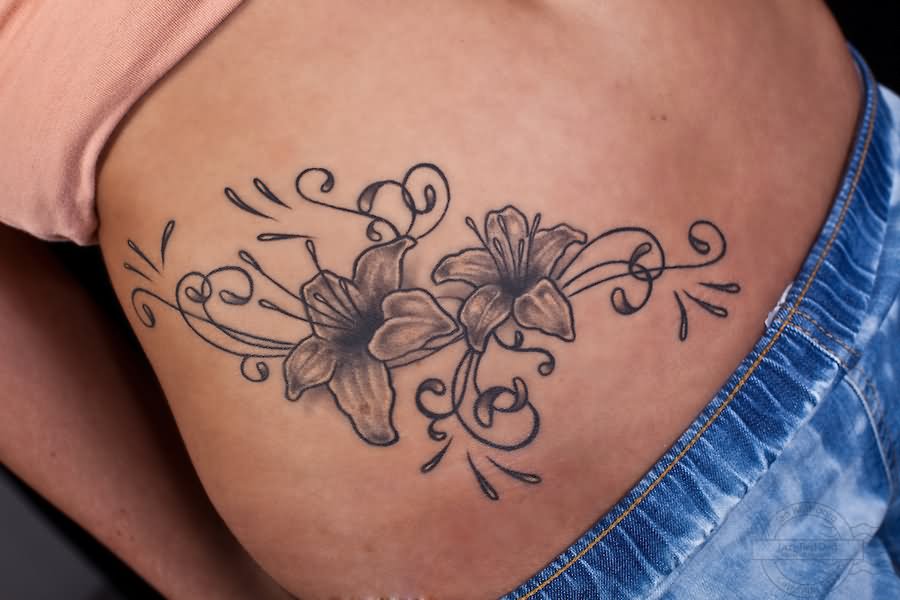 Black Ink Lily Flowers Tattoo On Side Belly