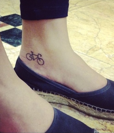 Black Little Bike Tattoo On Ankle