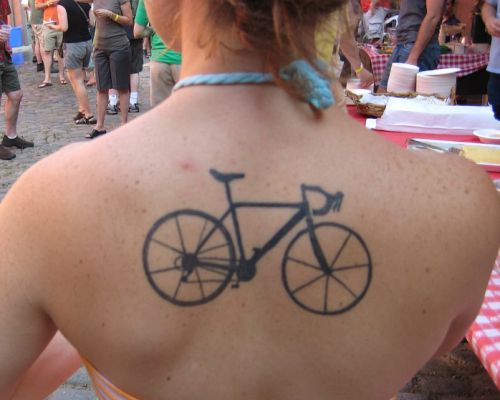Black Mountain Bike Tattoo On Girl Upper Back