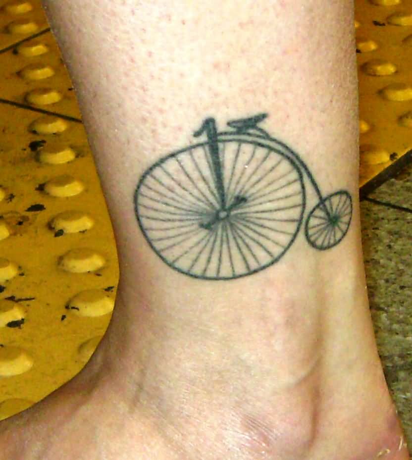 Black Penny Farthing Bike Tattoo On Leg