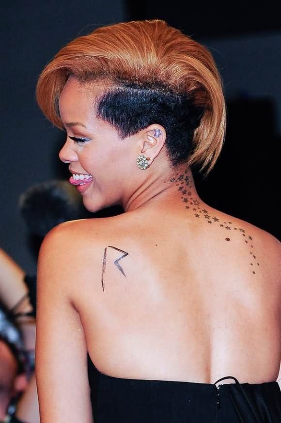 Black Stars Tattoo On Celebrity Rihanna  Back Neck