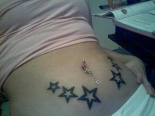 Black Stars Tattoo On Girl Belly.