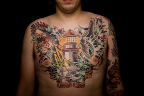 Bleeding Shark And Lighthouse Tattoo On Chest