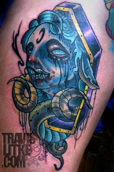Blue Ink Coffin Girl Tattoo