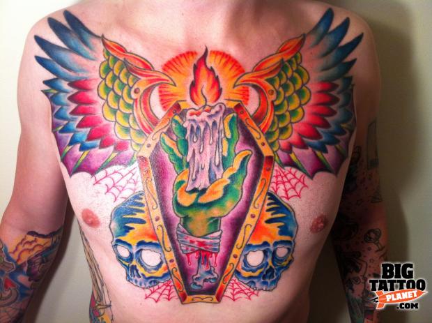 Burning Candle In Hand And Coffin With Wings Tattoo On Chest