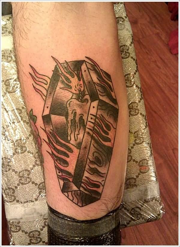 Burning Candle With Coffin Tattoo On Leg