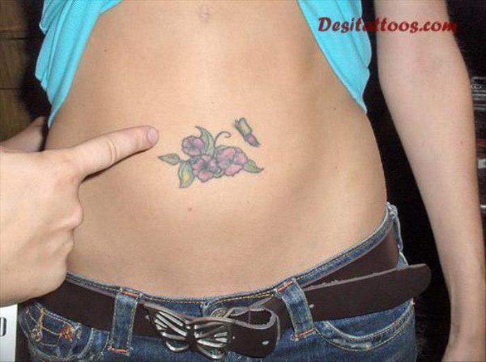 Butterfly With Flowers Tattoo On Belly Button