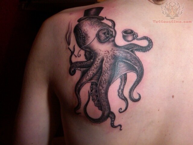 Classy Octopus With Hat Tattoo On Back Shoulder