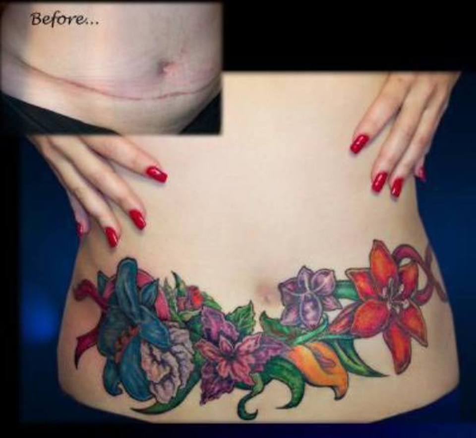 Colorful Flowers Tattoo On After Pregnancy Belly