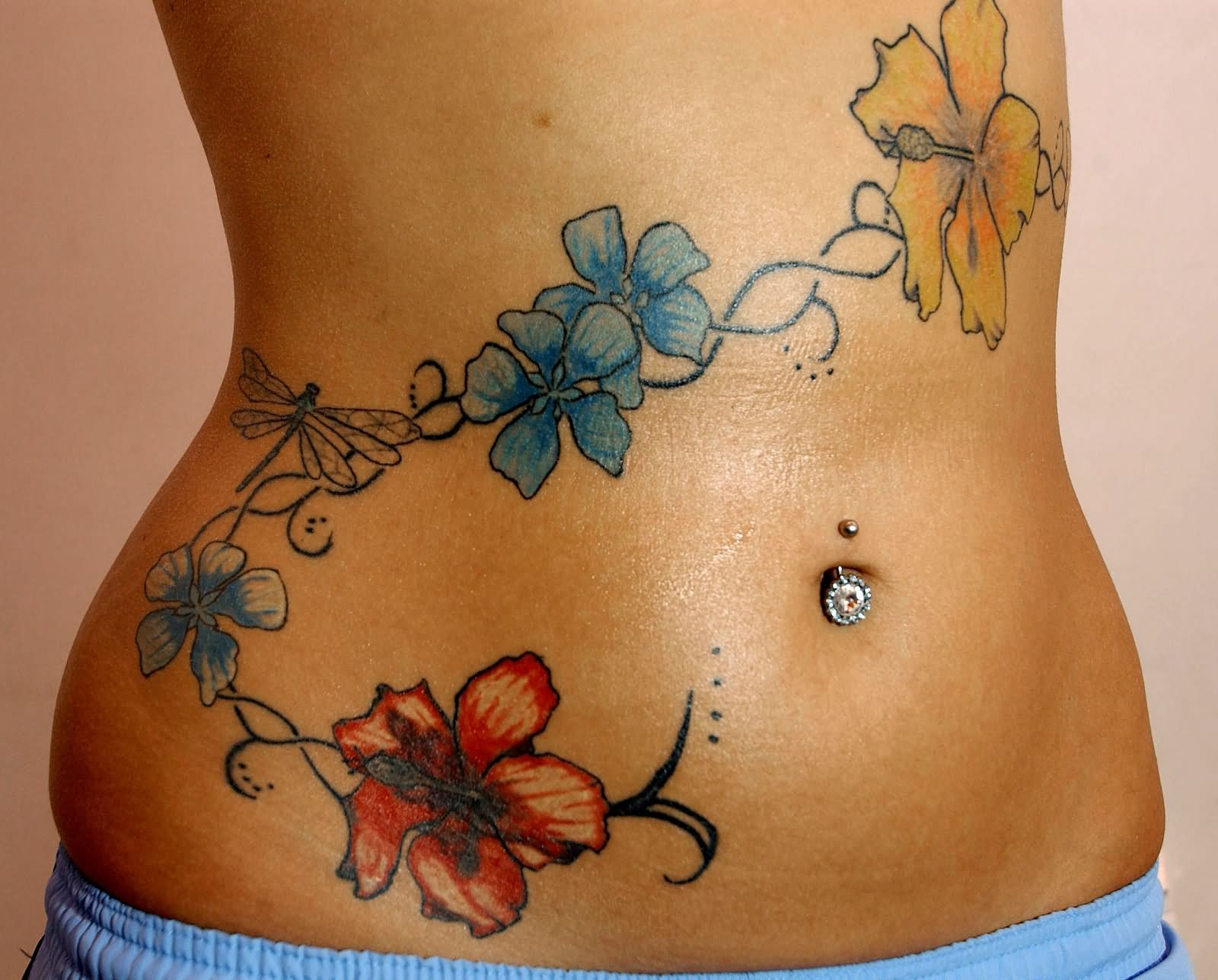 Colorful Flowers Tattoo On Belly