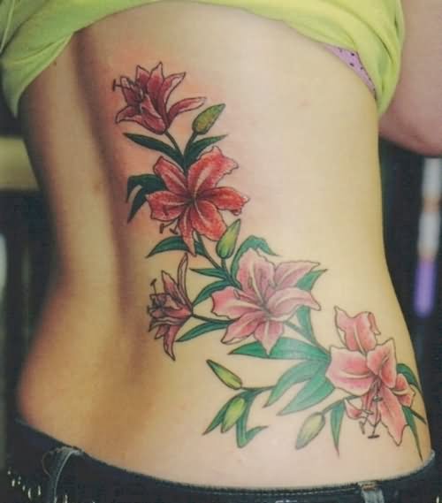 Colorful Flowers Tattoo On Side Belly