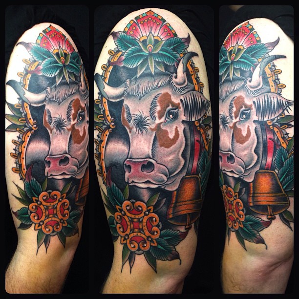 Colorful Traditional Cow And Flower Tattoo On Left Half Sleeve
