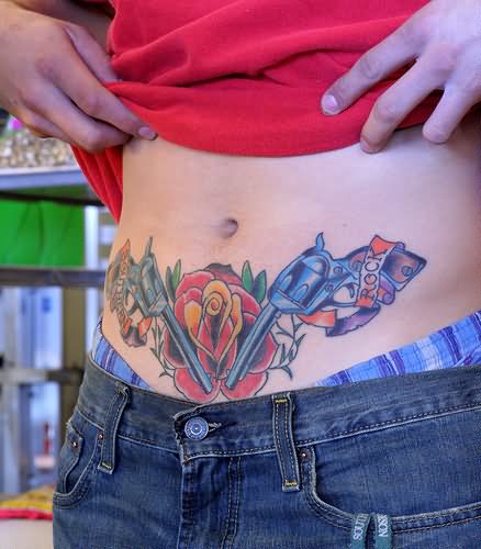 Colorful Two Gun With Rose Tattoo On Belly