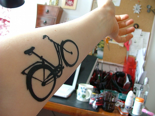 Cool Black Bike Tattoo On Forearm