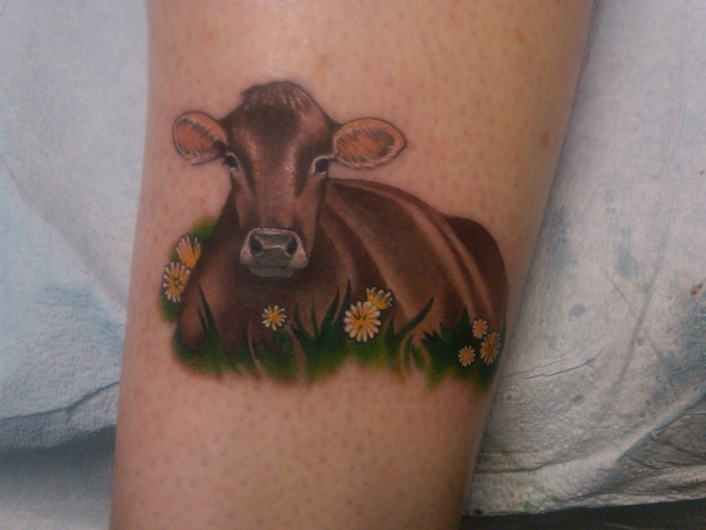 Cool Cow With Flowers Tattoo Design For Arm