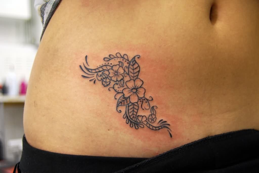 Cool Flowers With Leaves Tattoo On Belly