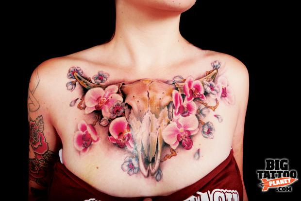 Cow Skull With Flowers Tattoo On Girl Chest