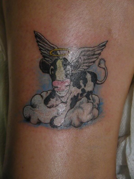 Cow With Angel Wings Tattoo Design