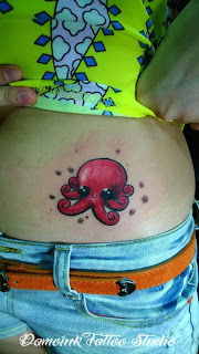 Cute Red Octopus Tattoo On Waist