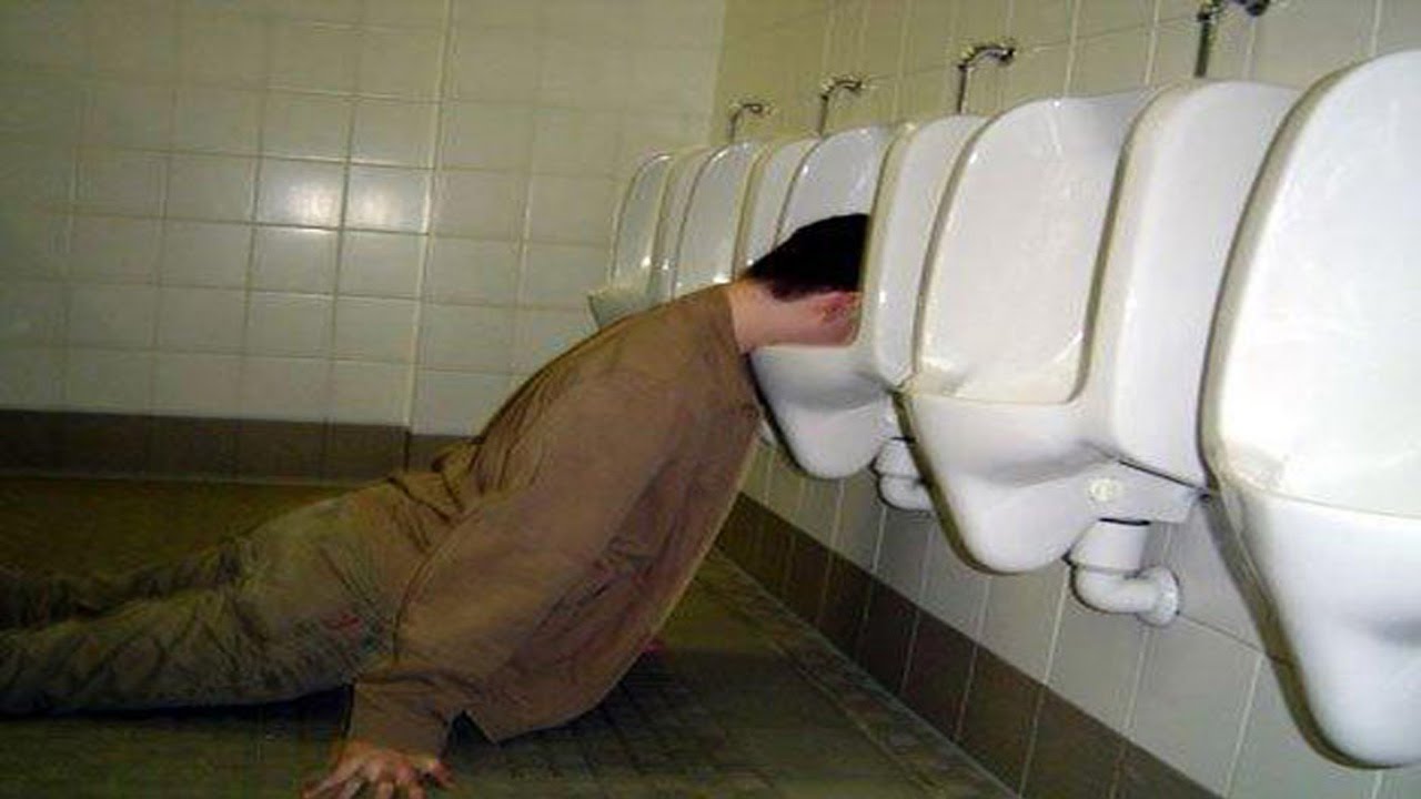 Drunken Man Lay Down In Urinal Funny Wtf Picture For Whatsapp