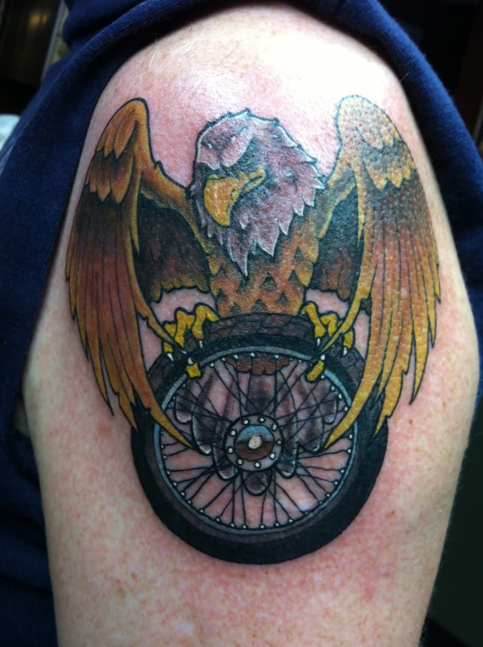Eagle On Bike Wheel Tattoo On Shoulder
