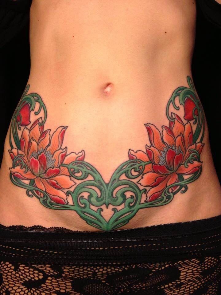 Flowers Tattoo On After Pregnancy Belly