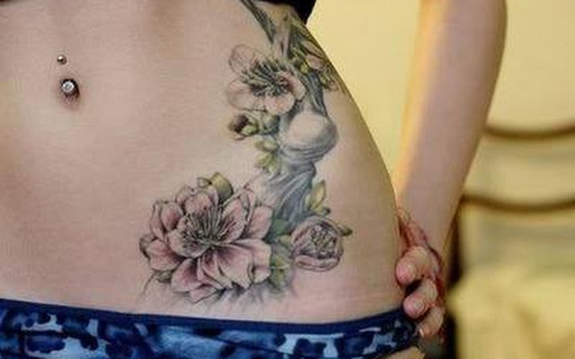 Flowers Tattoo On Girl Belly