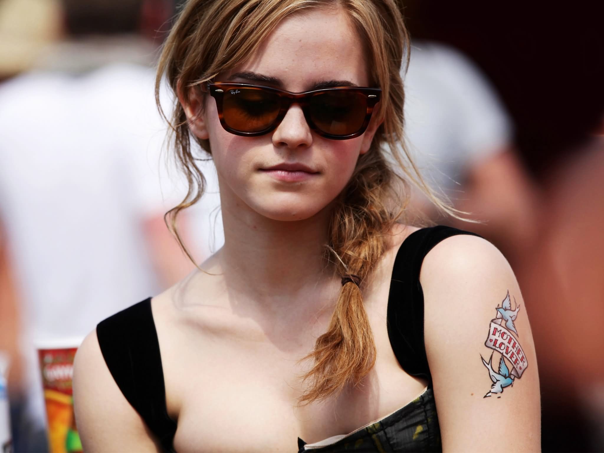 Flying Birds With Banner Tattoo On Celebrity Emma Watson  Left Shoulder