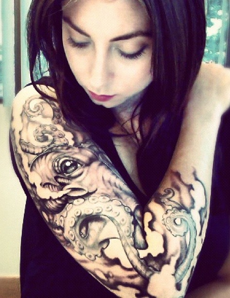 Girl Showing Her Octopus Sleeve Tattoo