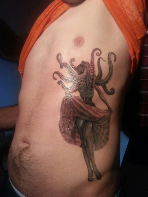 Girl With Octopus Head Tattoo On Side