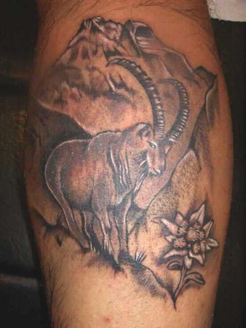 Goat Capricorn With Flowers Tattoo On Leg