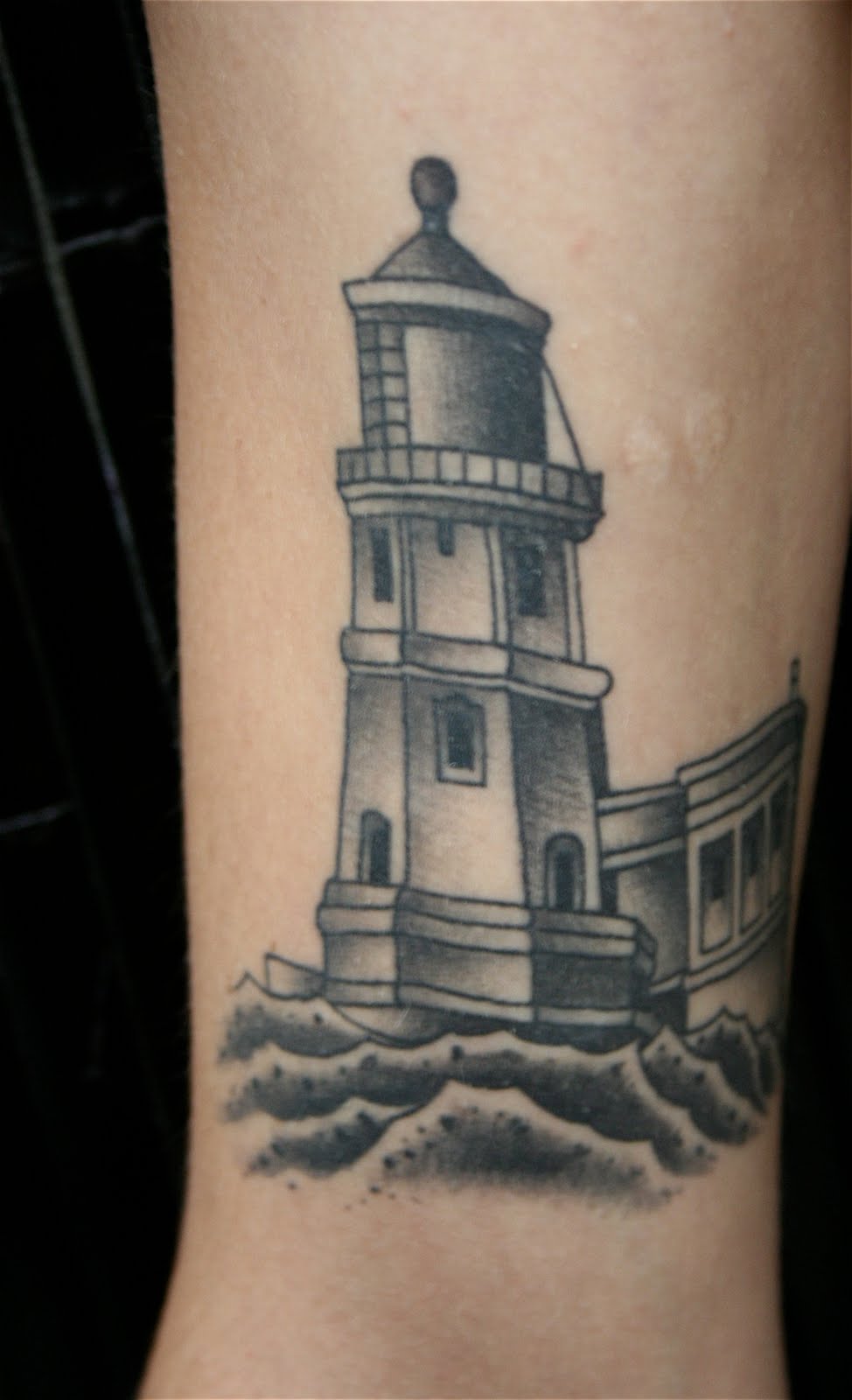 Grey Ink Lighthouse Tattoo Image